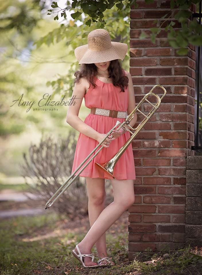 senior girl in hat and trombone st louis photographers