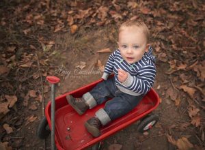 one year old boy in a wagon