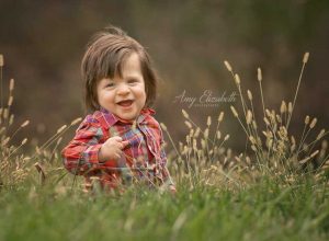 baby boy session with big smile