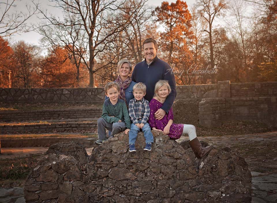 family of five on rock bridge