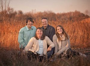 family of four for birthday session in iowa