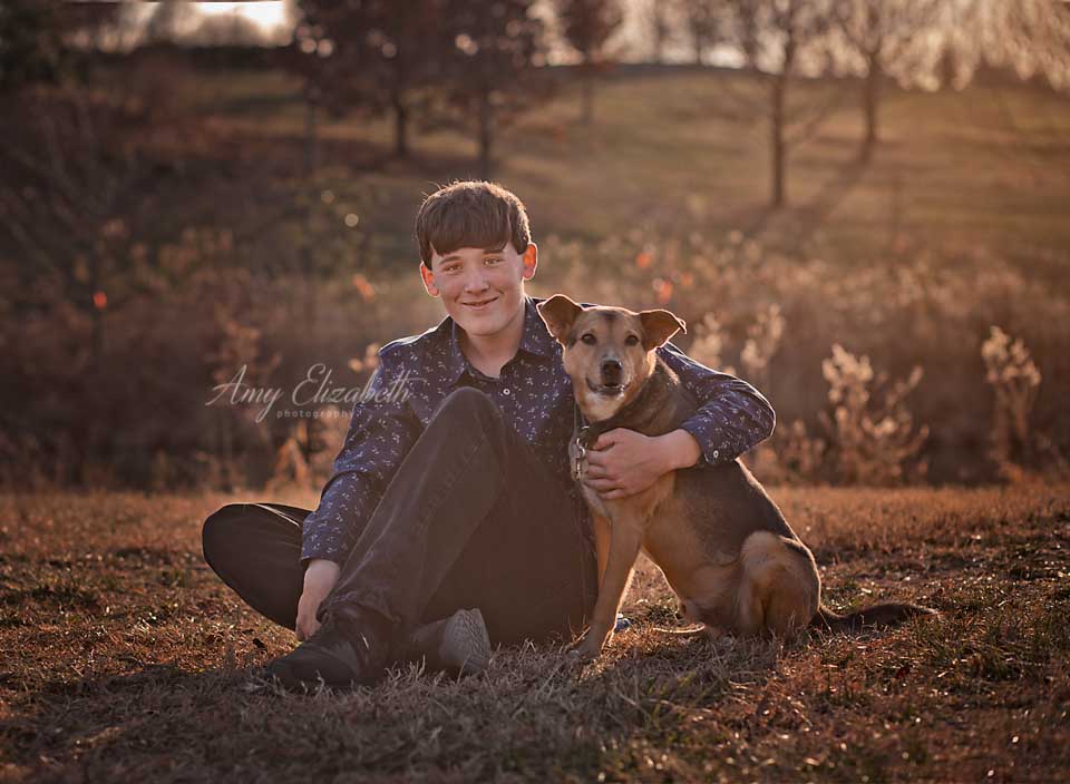 senior boy and dog at forest park st louis photographer