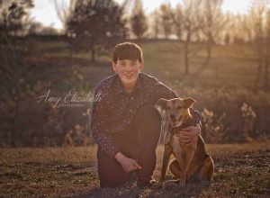 senior boy and dog at forest park st louis photographer