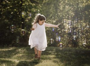 girl dancing in bubbles st louis photographer